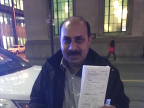 Cabbie Mohammad Asie said he was ticketed by Toronto Police after driving from the King St. pilot project.