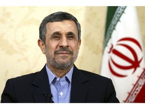 Former Iranian President Mahmoud Ahmadinejad gives an interview to The Associated Press at his office, in Tehran, Iran, Saturday, April 15, 2017.