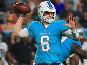 Dolphins quarterback Jay Cutler looks to pass the ball during NFL action against the Raiders at Hard Rock Stadium in Miami Gardens, Fla., on Sunday, Nov. 5, 2017. (Chris Trotman/Getty Images)