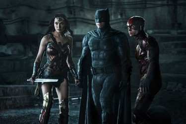(L-r) GAL GADOT as Wonder Woman, BEN AFFLECK as Batman and EZRA MILLER as The Flash in Warner Bros. Pictures' action adventure "JUSTICE LEAGUE," a Warner Bros. Pictures release.