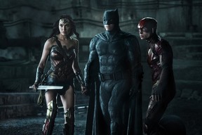 (L-r) GAL GADOT as Wonder Woman, BEN AFFLECK as Batman and EZRA MILLER as The Flash in Warner Bros. Pictures' action adventure