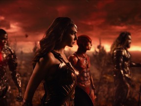(L-R) RAY FISHER as Cyborg, GAL GADOT as Wonder Woman, EZRA MILLER as The Flash and JASON MOMOA as Aquaman in Warner Bros. Pictures' action adventure "JUSTICE LEAGUE," a Warner Bros. Pictures release.