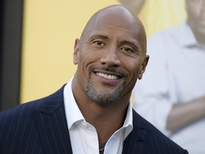 In this June 10, 2016 file photo, Dwayne Johnson attends the premiere of his film, "Central Intelligence" in Los Angeles.