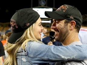 Justin Verlander of the Houston Astros celebrates with fiancee Kate Upton after the Astros defeated the Los Angeles Dodgers 5-1 in game seven to win the 2017 World Series at Dodger Stadium on November 1, 2017 in Los Angeles, California.