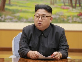 This picture taken on September 3, 2017 and released by North Korea's official Korean Central News Agency (KCNA) on September 4, 2017 shows North Korean leader Kim Jong-Un attending a meeting with a committee of the Workers' Party of Korea about the test of a hydrogen bomb, at an unknown location. North Korea said it detonated a hydrogen bomb designed for a long-range missile on September 3 and called its sixth and most powerful nuclear test a 'perfect success', sparking world condemnation and promises of tougher US sanctions. (STR/AFP/Getty Images)