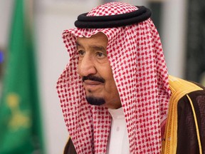 In this photo provided by the Saudi Press Agency, King Salman attends a swearing in ceremony in Riyadh, Saudi Arabia, Monday, Nov. 6, 2017. The king has sworn in new officials to take over from a powerful prince and former minister believed to be detained in a large-scale sweep that has shocked the country and upended longstanding traditions within the ruling family. (Saudi Press Agency, via AP)