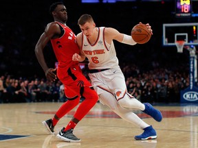 New York Knicks forward Kristaps Porzingis drives against Toronto Raptors forward Pascal Siakam on Nov. 22, 2017