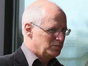 Ben Levin, Ontario's former deputy education minister, walks into Finch Ave court ahead of being sentenced to three years prison for child porn offences on Friday, May 29, 2015.