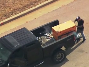 A suspected pick-up truck thief led police in Oklahoma City, Okla. on a long chase before he finally crashed the vehicle into a pond and tried to flee on foot before officers caught up with him. (AP screengrab)