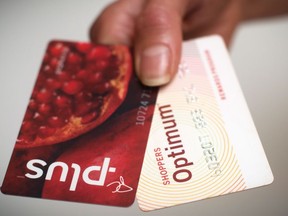 A Loblaws PC Plus and a Shoppers Drug Mart Optimum card are shown together in Toronto on Tuesday. Nov. 7, 2017/