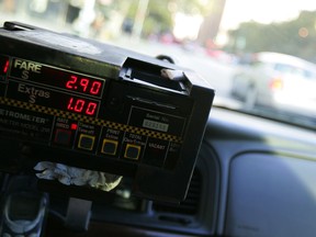 A taxi cab meter reads $3.90 in midtown Manhattan, N.Y., on Oct. 25, 2006. (Chris Hondros/Getty Images/Files)