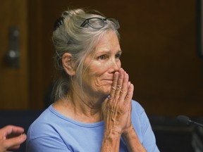 Leslie Van Houten reacts after hearing she is eligible for parole during a hearing on Wednesday, Sept. 6, 2017 at the California Institution for Women in Corona, Calif. Van Houten, the youngest of Charles Manson's murderous followers, was granted parole by a California board Wednesday. (Stan Lim/Los Angeles Daily News via AP, Pool) ORG XMIT: CAVAN301