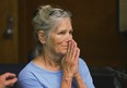 Leslie Van Houten reacts after hearing she is eligible for parole during a hearing on Wednesday, Sept. 6, 2017 at the California Institution for Women in Corona, Calif. Van Houten, the youngest of Charles Manson's murderous followers, was granted parole by a California board Wednesday. (Stan Lim/Los Angeles Daily News via AP, Pool) ORG XMIT: CAVAN301