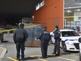 Peel Regional Police at the scene of a fatal stabbing outside Meadowvale Town Centre on Wednesday, Nov. 22, 2017. David Ritchie/Special to the Toronto Sun