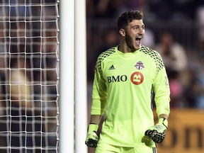 Toronto FC's goalkeeper Alex Bono celebrates at the end pf an MLS soccer match against the Philadelphia Union, Saturday, Aug. 20, 2016, in Chester, Pa. (AP Photo/Michael Perez)