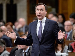 Finance Minister Bill Morneau responds to a question during Question Period in the House of Commons Wednesday, Nov. 29, 2017 in Ottawa. THE CANADIAN PRESS/Adrian Wyld