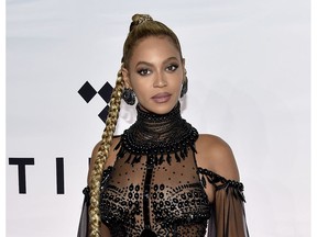 FILE - In this Oct. 15, 2016 file photo, singer Beyonce Knowles attends the Tidal X: 1015 benefit concert in New York. Beyonce is nominated for Grammy Awards for best album, best song and record of the year.  FILE PHOTO.
Evan Agostini, AP