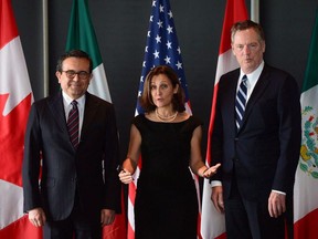 Minister of Foreign Affairs Chrystia Freeland meets for a trilateral meeting with Mexico's Secretary of Economy Ildefonso Guajardo Villarreal, left, and Ambassador Robert E. Lighthizer, United States Trade Representative, during the final day of the third round of NAFTA negotiations at Global Affairs Canada in Ottawa on Sept. 27, 2017.