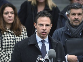 Attorney Josh Koskoff addresses the media after presenting arguments before the state Supreme Court in a lawsuit against Remington Arms in Hartford, Conn., Tuesday, Nov. 14, 2017.