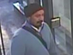 A man sought in an alleged fraud and sexual assault Oct. 17, 2017 at the Eaton Centre.