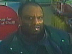 Toronto Police are looking for a man connected with a stolen poppy donation box investigation.