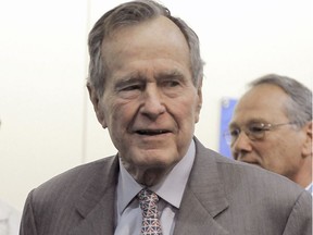 In a Tuesday, Dec. 2, 2008 file photo, former President George H. W. Bush leaves a news conference at the Houston hospital.