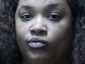 Police said in a statement that  Cross of Springdale, Md., turned herself in to officers Thursday, Nov. 16, 2017 in Maryland's Howard County. She is charged with burglary and theft.   (Howard County, Md. Police via AP)