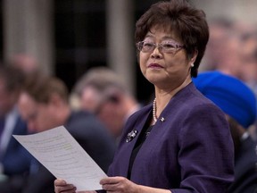 Minister of State (Seniors) Alice Wong responds to a question during Question Period in the House of Commons in Ottawa on March 13, 2012. THE CANADIAN PRESS/Adrian Wyld
