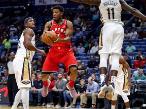 Toronto Raptors guard Kyle Lowry looks to pass during a game against the New Orleans Pelicans on Nov. 15, 2017