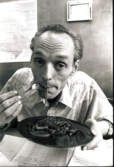 PEAKE ARCHIVES: A man eating worms from his bait shop in Toronto. This shot was considered shocking at the time and got a lot of reader reaction in the 1970s.