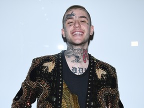 Lil Peep attends the Balmain Menswear Spring/Summer 2018 show as part of Paris Fashion Week on June 24, 2017 in Paris, France. (Photo by Pascal Le Segretain/Getty Images)