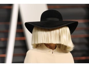 In this Feb. 22, 2015, file photo, Sia arrives at the 2015 Vanity Fair Oscar Party in Beverly Hills, Calif. (Photo by Evan Agostini/Invision/AP, File)