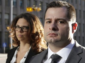 James Forcillo leaves 361 University Courthouse with his wife Irina Forcilla on Wednesday, Sept. 30, 2015.