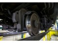 Wheels of a TTC subway car under maintenance  at TTC's Greenwood subway yard in Toronto, Ont. on Wednesday July 20, 2016.