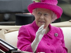 Newly leaked papers have revealed that Britain's Queen Elizabeth II has placed some of her private money into offshore tax havens. (Alastair Grant/AP Photo/Files)