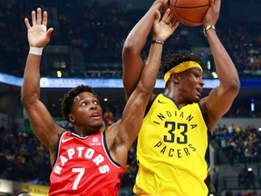 Toronto Raptors guard Kyle Lowry tries to take the basketball from Indiana Pacers centre Myles Turner on Nov. 24, 2017