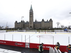 Crews work on the skating rink on Parliament Hill in Ottawa Wednesday, Nov. 29, 2017.