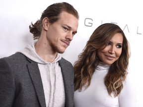 In this Dec. 4, 2015, file photo, Ryan Dorsey, left, and his wife Naya Rivera arrive at an event at the Beverly Wilshire hotel in Beverly Hills, Calif.