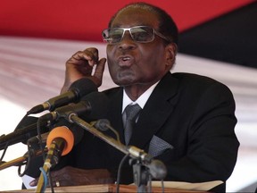 Lawyers and a U.S. Embassy official have said Friday, Nov. 3, 2017, Zimbabwe police have arrested an American citizen for allegedly insulting President Robert Mugabe on Twitter. (Tsvangirayi Mukwazhi/AP Photo)