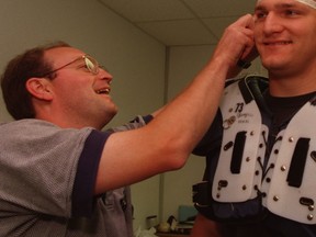 Argos equipment manager  Danny Webb does his thing in this 2005 photo. Postmedia Network file photo