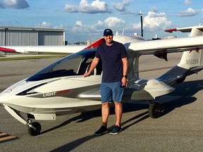In this Oct. 13, 2017 photo posted to Twitter, Roy Halladay stands next to the plane he "dreamed about owning."