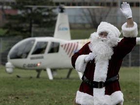 Santa's elaborate entrance by helicopter has been promoted for several days. (ALLEN MCINNIS/Postmedia)