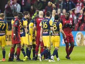 Toronto FC forward Jozy Altidore (17) reacts as he receives a yellow card during first half MLS Eastern Conference semifinal action against the New York Red Bulls, in Toronto on Sunday, November 5, 2017. THE CANADIAN PRESS/Mark Blinch