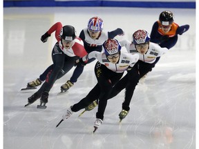 South Korea's Choi Min-jeong, center, competes against Canada's Kim Boutin, left, and South Korea's Shim Suk-hee, second from right, during the women's 1,000-meter final race at the ISU World Cup Short Track Speed Skating competition in Seoul, South Korea, Sunday, Nov. 19, 2017. (AP Photo/Ahn Young-joon)