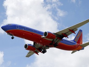In this Aug. 26, 2016, file photo, a Southwest Airlines jet makes its approach to Dallas Love Field.