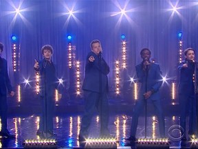 Left to right: Finn Wolfhard, Gaten Matarazzo, James Corden, Caleb McLaughlin, and Noah Schnapp showed off their vocal talents when they performed a Motown medley on ."The Late Late Show with James Corden."