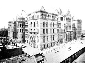 Considering the scope of project and the time it took to complete (more than a decade) there are very few photographs showing the construction of Toronto’s magnificent “Old” City Hall. This one, from the City of Toronto Archives and undated, shows the east side (James St.) of the building and the tons of New Brunswick and Credit Valley brown and greystone yet to be placed.