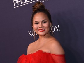 Chrissy Teigen attends the 2017 Baby2Baby gala at 3labs in Culver City, November 11, 2017. / AFP PHOTO / CHRIS DELMASCHRIS DELMAS/AFP/Getty Images