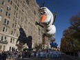 The Olaf balloon glides over Central Park West during the Macy's Thanksgiving Day Parade in New York, Thursday, Nov. 23, 2017. (AP Photo/Craig Ruttle)