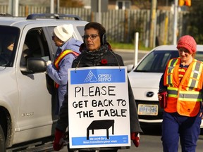 Fleming College faculty picket at the college November 7, 2017 in Peterborough.